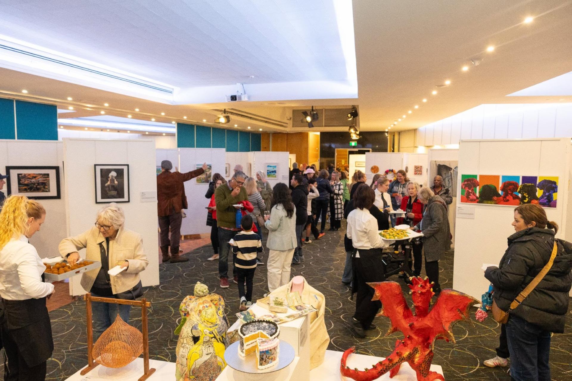 Opening night of the Belong Art Exhibition with attendees