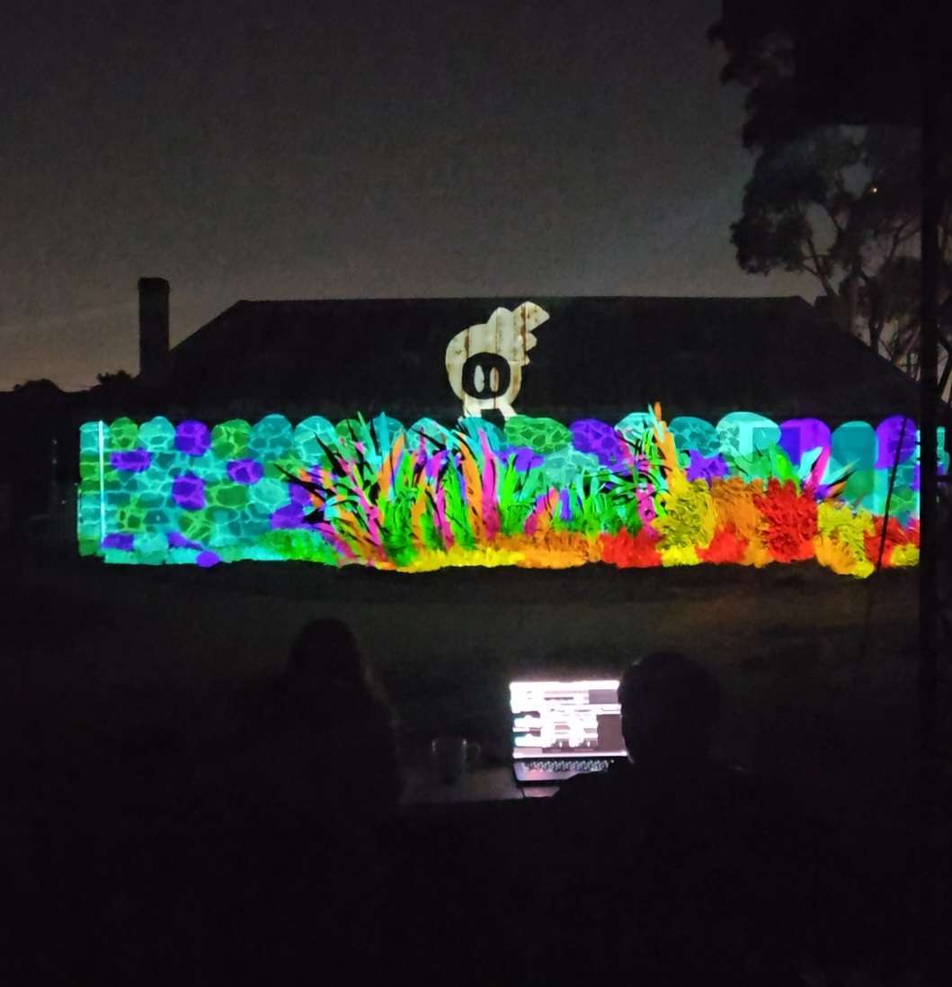 Curious Tadpole of Edgar's Creek — projection animation on a building facade